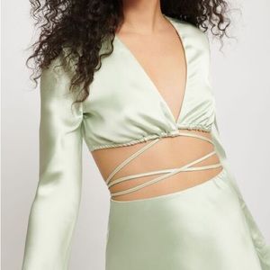 Super cute Callie Wrap Satin Blouse from dynamite. Size Medium.